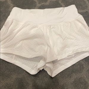 White lululemon shorts, lined